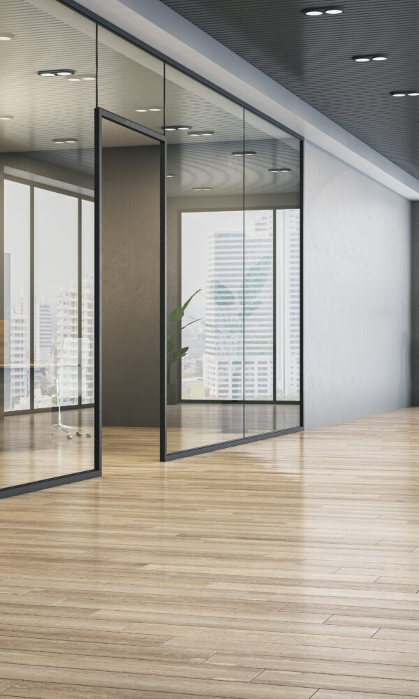 Image of glass partitions inside a modern office