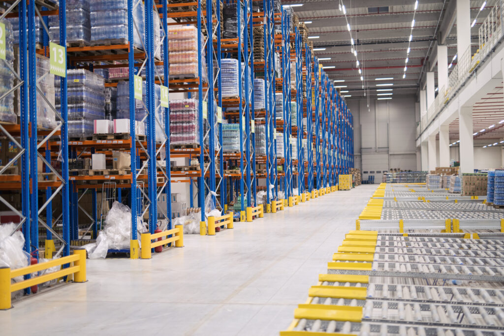 Picture of a modern industrial hangar containing storage equipment.